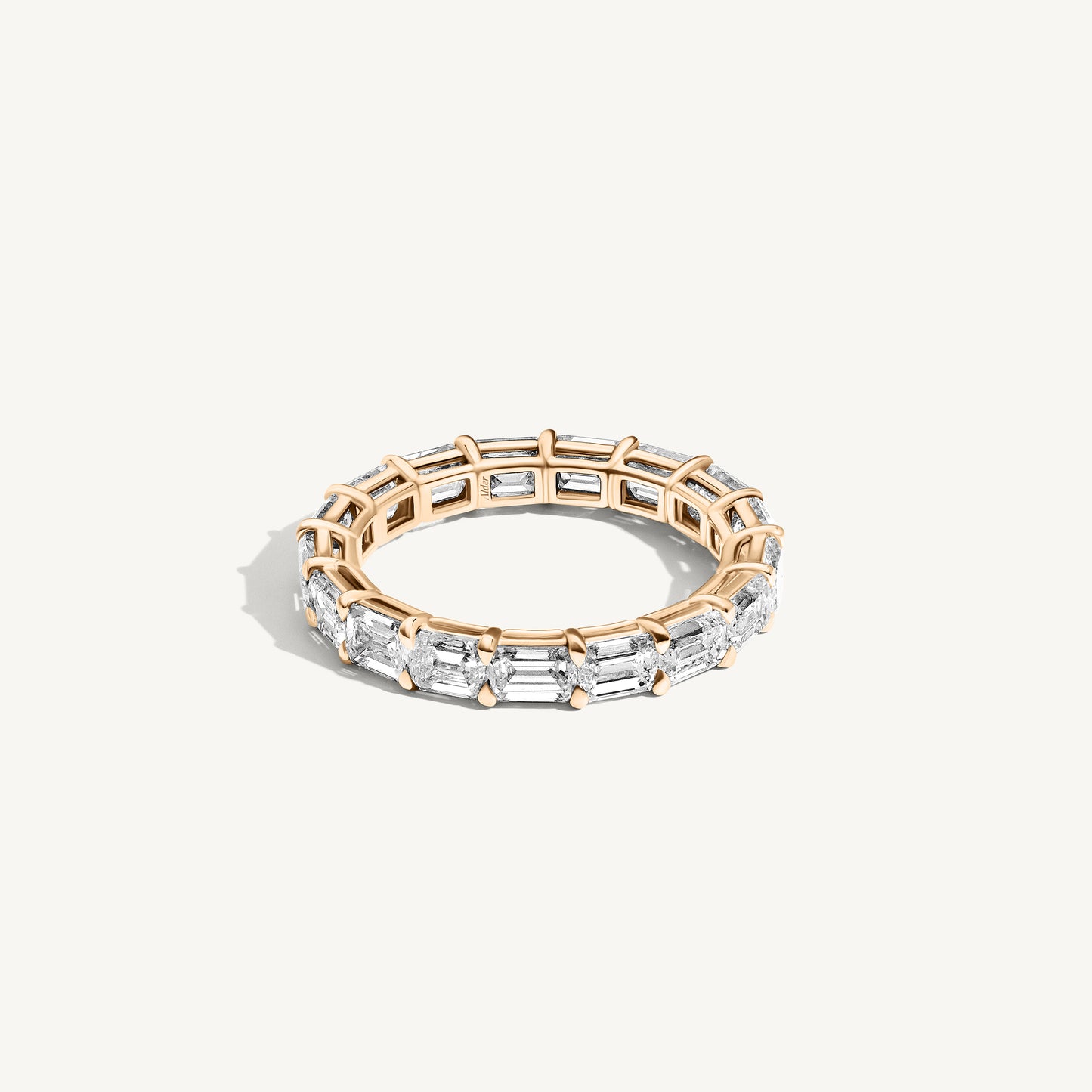 
                  
                    East West Emerald Eternity Band
                  
                