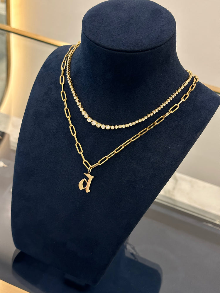 
                  
                    Solid Gold Gothic Initial Charm
                  
                