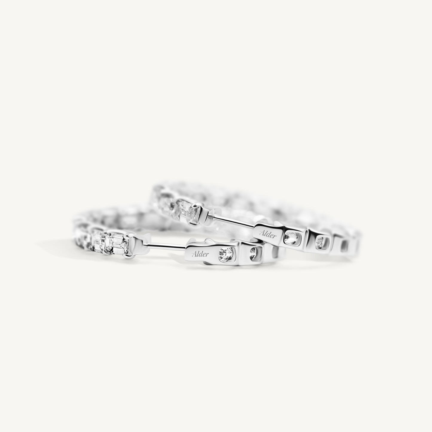 
                  
                    Emerald Cut Hoops
                  
                