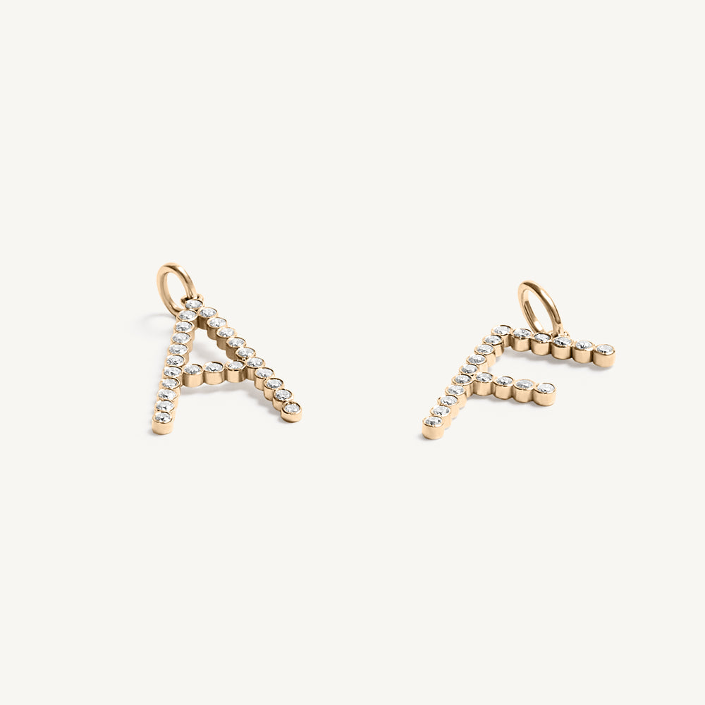 
                  
                    Jumbo Bezel Set Round Diamond Initial Charm
                  
                