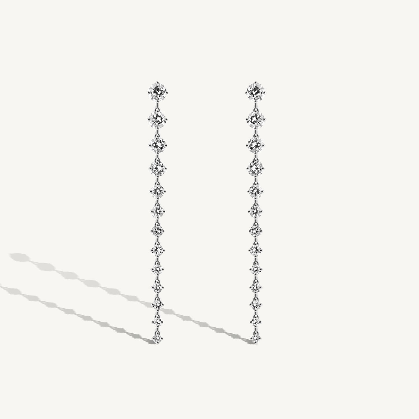 
                  
                    Graduated Round Diamond Drop Earrings
                  
                