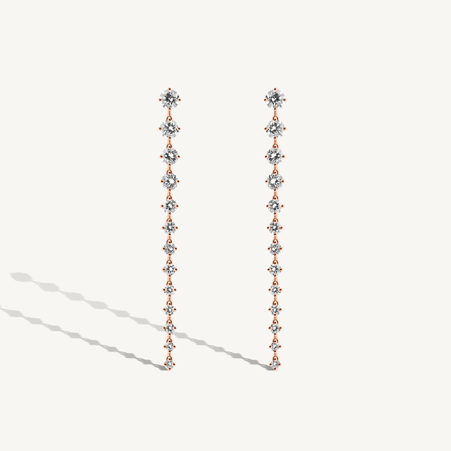 
                  
                    Graduated Round Diamond Drop Earrings
                  
                